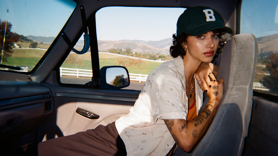 Women sitting in the front sit of a car
